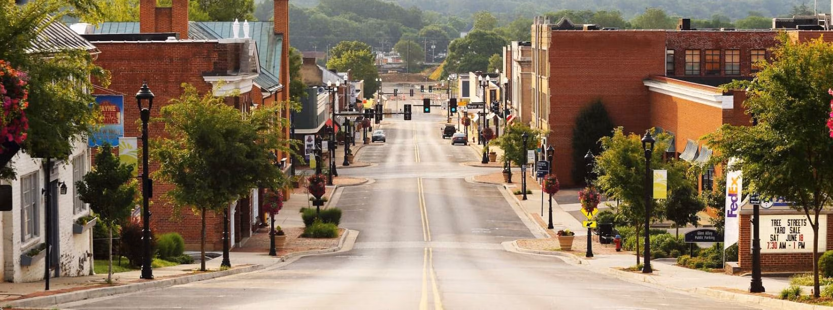 Downtown Waynesboro, Virginia main street lined with brick buildings and trees