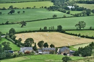 farm fields with stone buildings