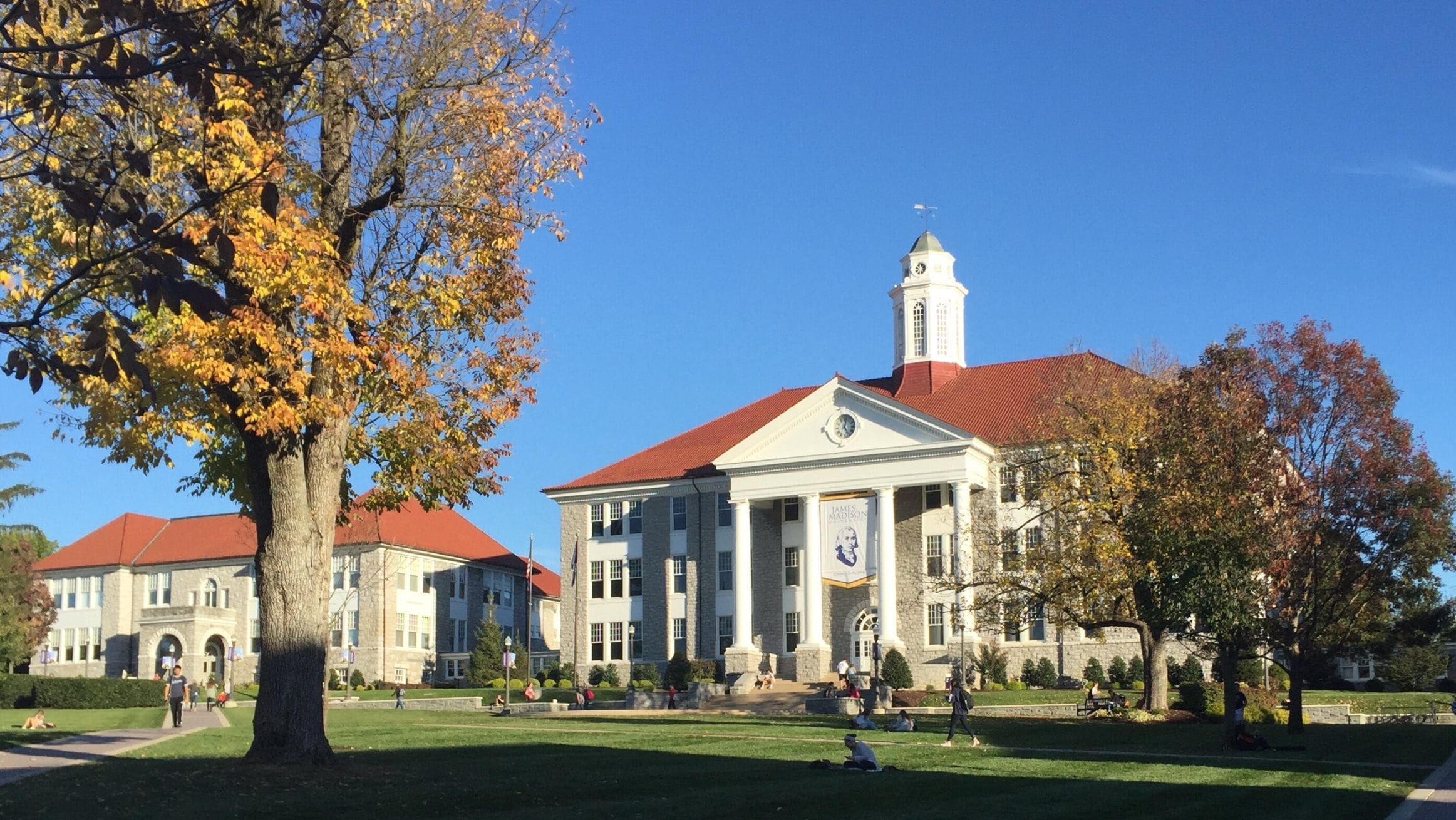 Aerial view of James Madison University campus in Harrisonburg, Virginia with fall foliage