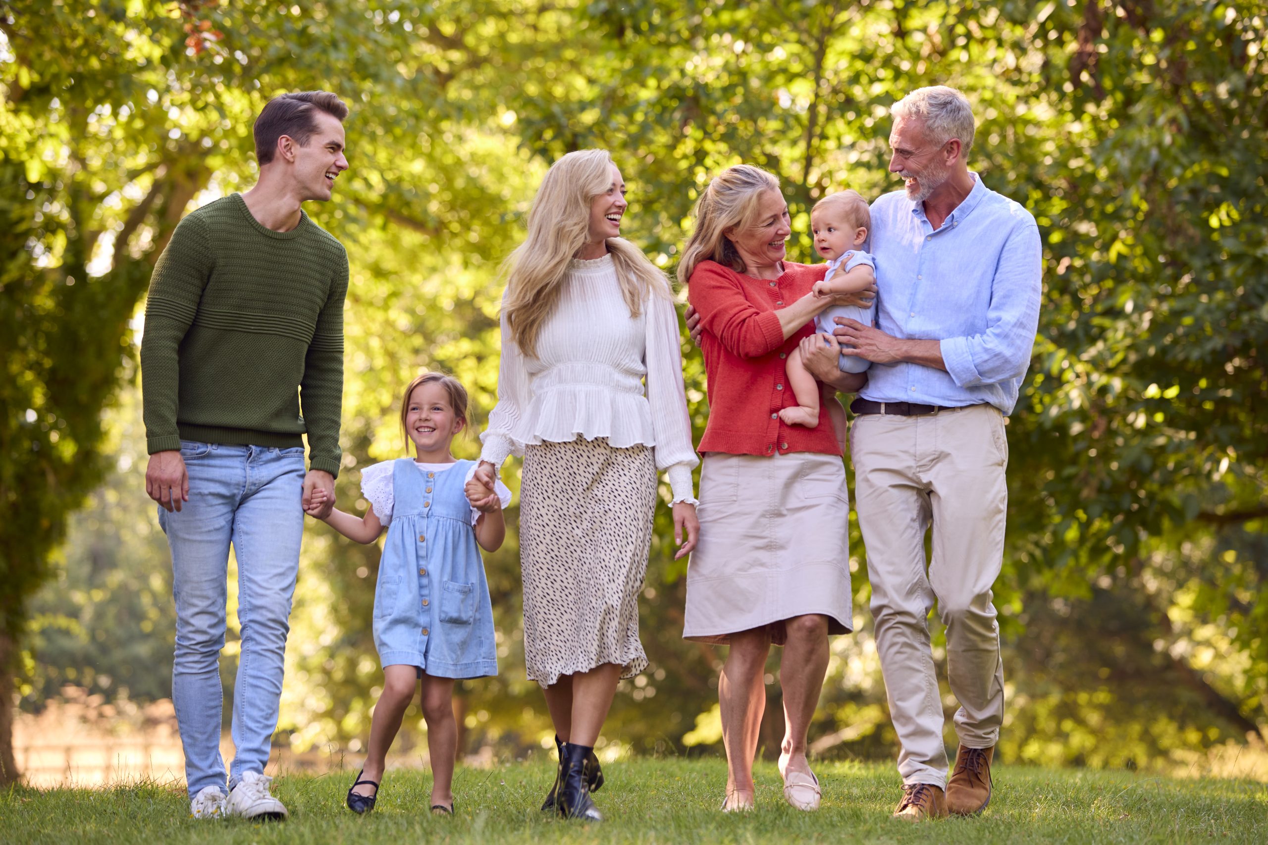 Multi-generation Virginia family walking together outdoors
