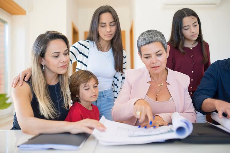 Family reviewing estate planning documents together at a table