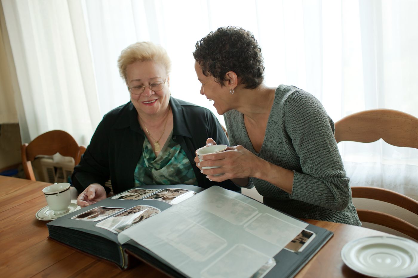 A mother and adult daughter reviewing family gifts and the Virginia Medicaid look-back