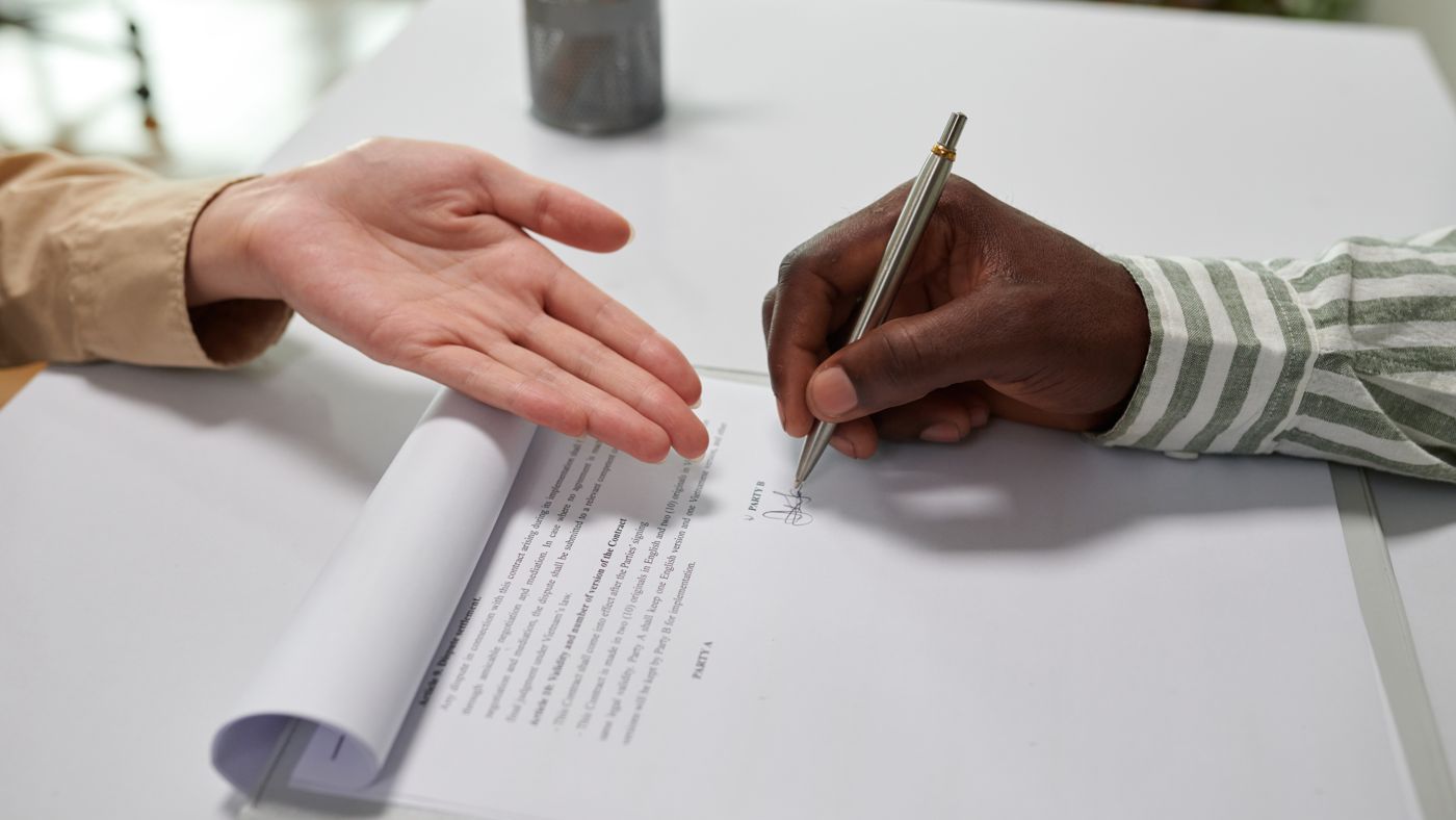 A Virginia couple meeting with an attorney about a Medicaid Asset Protection Trust